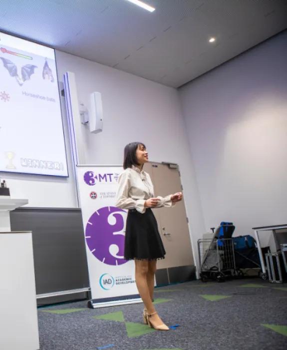 Student presenting at the three minute thesis competition